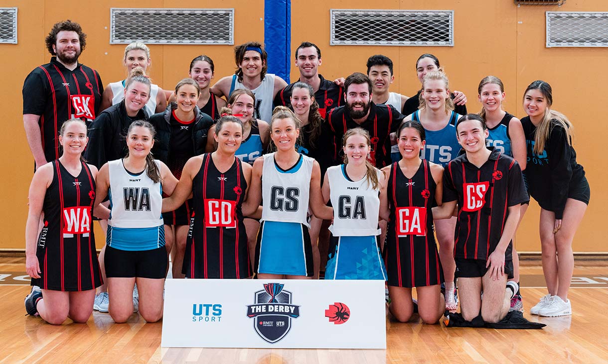 Mixed netball athletes from RMIT and UTS pose together for a photo