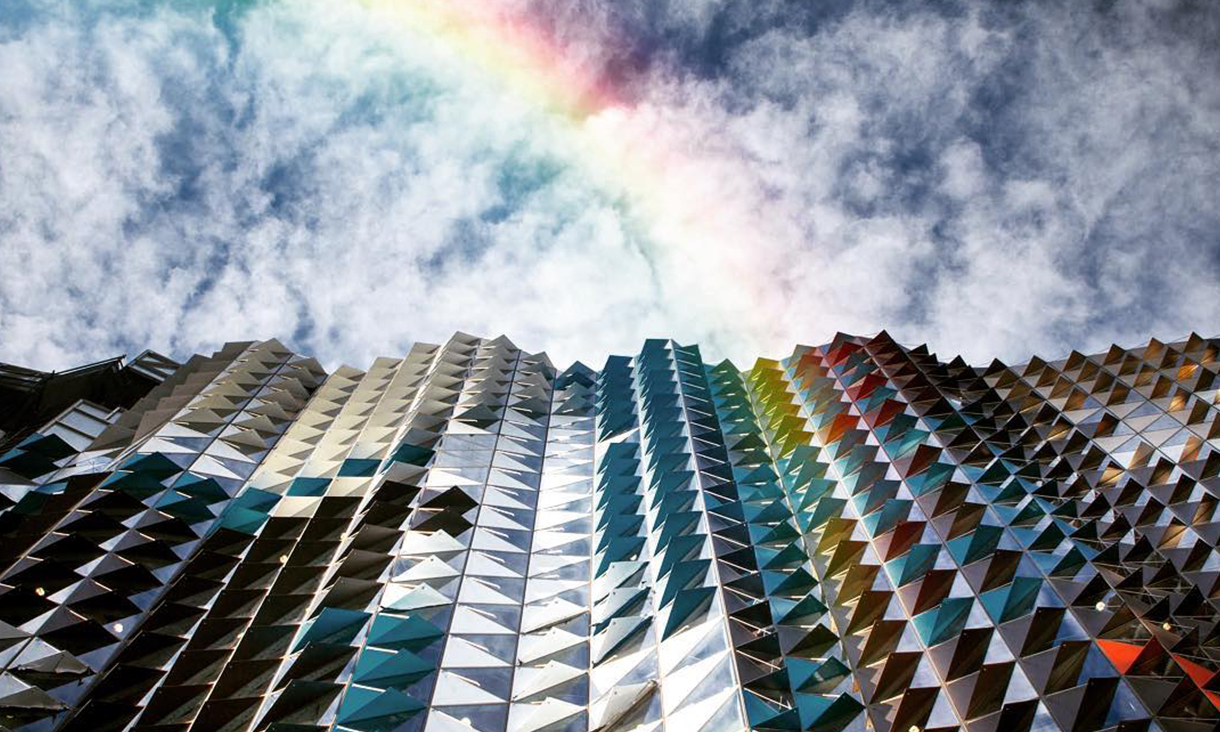 RMIT building with rainbow